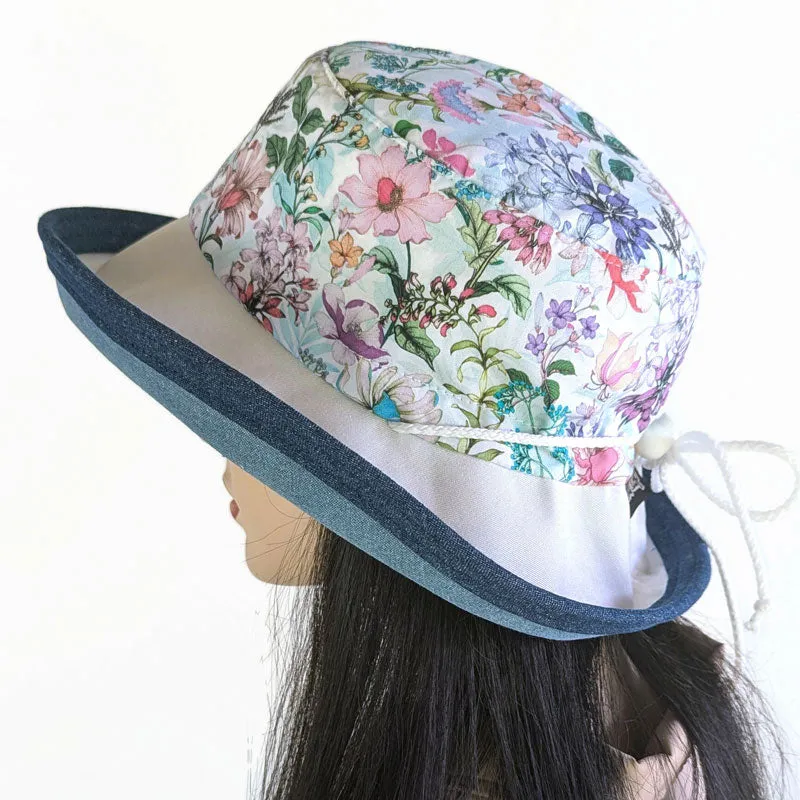 Sunblocker UV summer sun hat with wide brim, featuring pretty flowers, adjustable fit