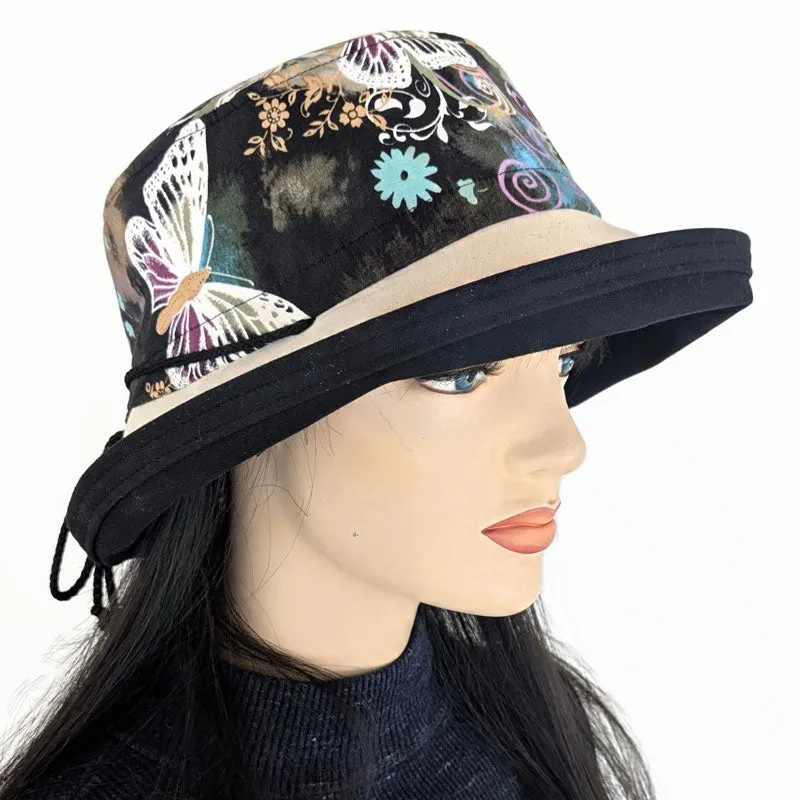 Sunblocker UV summer sun hat with wide brim, pretty butterflies on black, adjustable fit