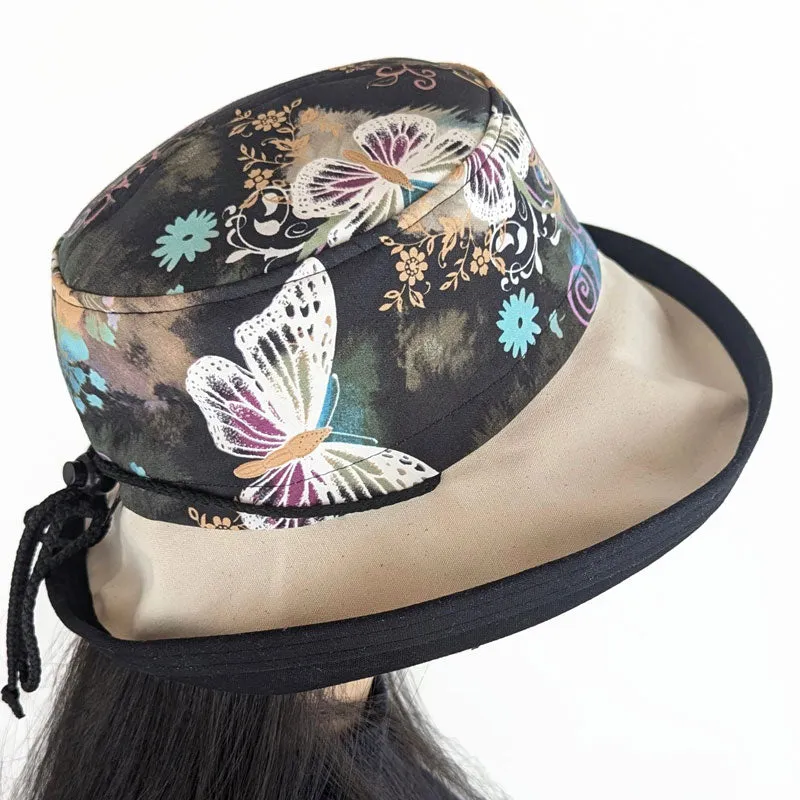 Sunblocker UV summer sun hat with wide brim, pretty butterflies on black, adjustable fit